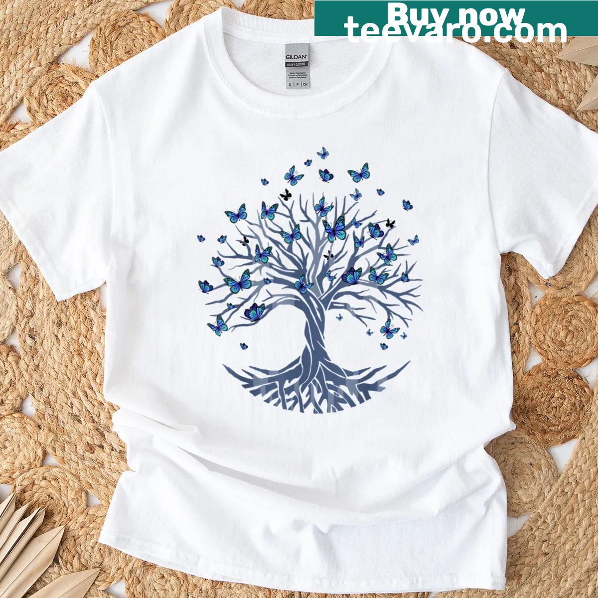 Butterfly tree graphic design on a nature-themed T-shirt — on a men's t-shirt