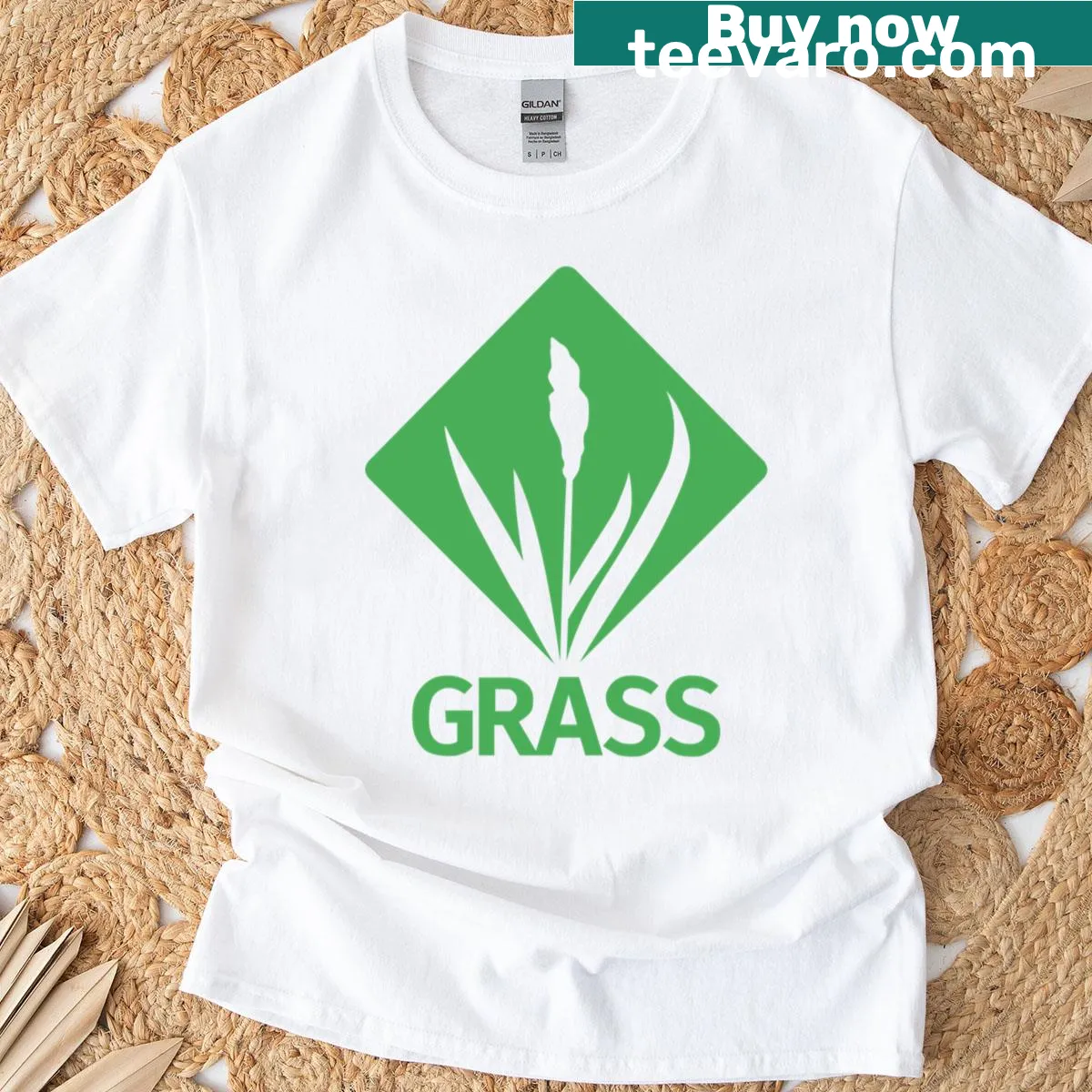 Bold grass green logo graphic t-shirt — on a men's t-shirt