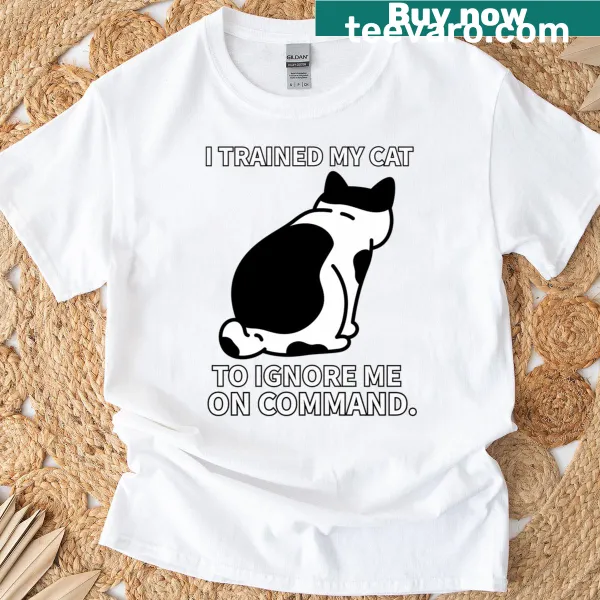 Humorous cat-themed t-shirt with the phrase about training cats
