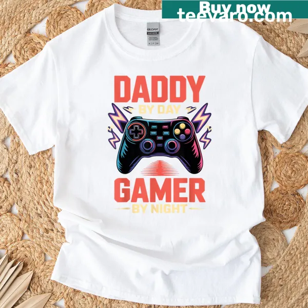 Humorous Daddy By Day Gamer graphic T-shirt for dads
