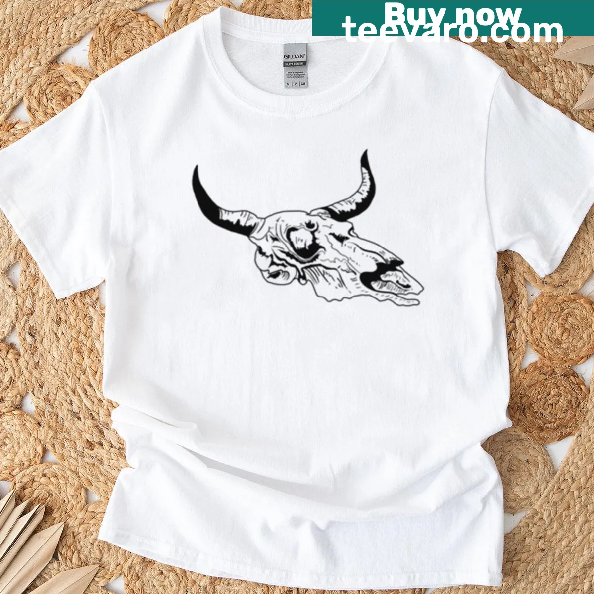 Vintage distressed oversized t-shirt featuring a bull skull graphic — on a men's t-shirt