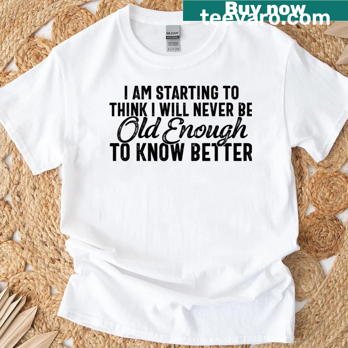 Lighthearted typography on a T-shirt about never growing up. — on a men's t-shirt