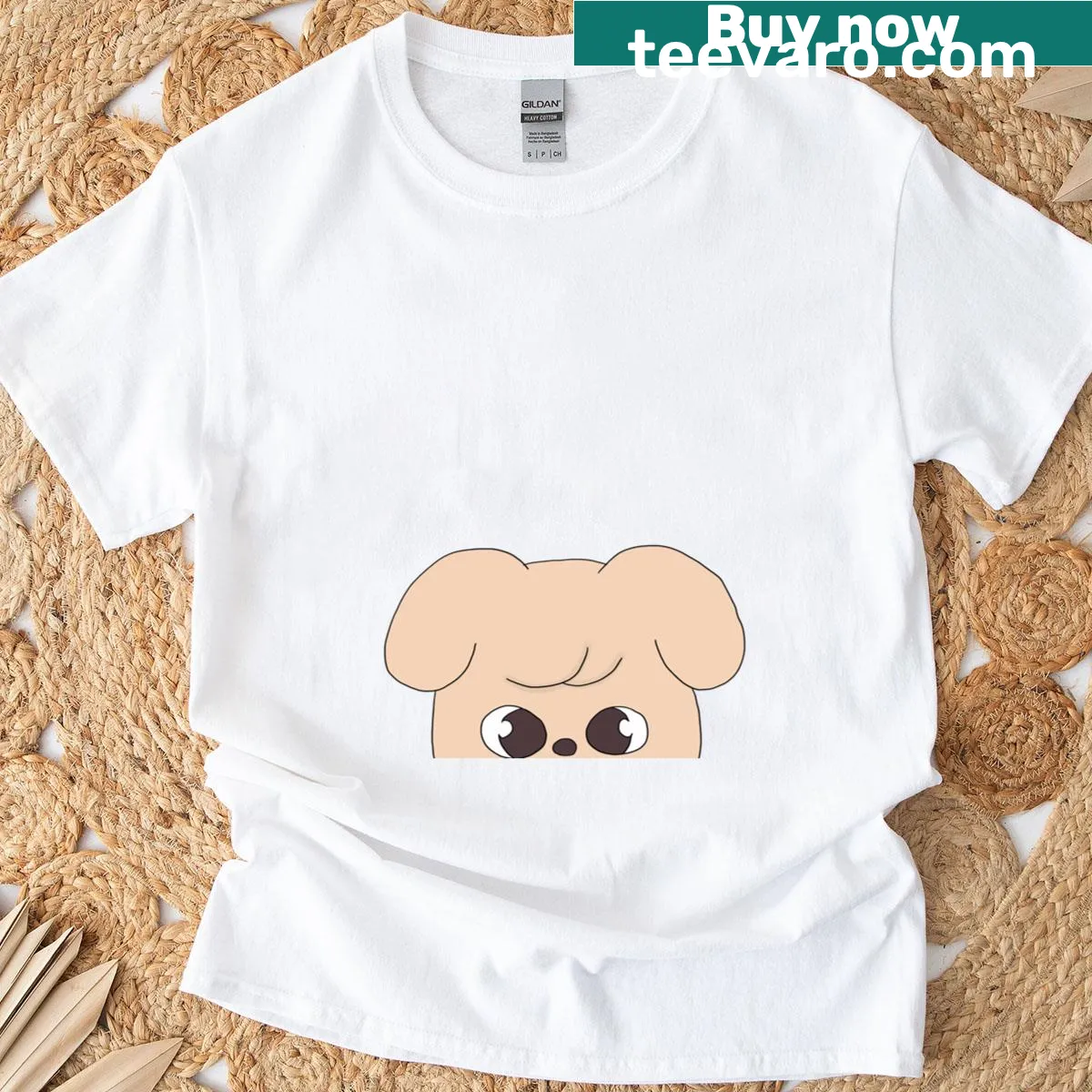Playful puppy peekaboo graphic t-shirt for dog enthusiasts. — on a men's t-shirt