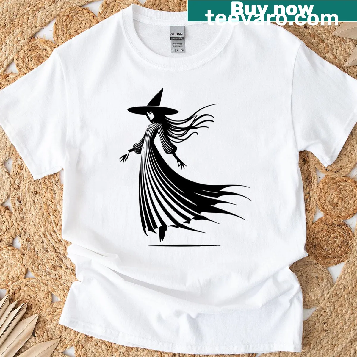 Minimalist graphic of a soaring witch in gothic style — on a men's t-shirt
