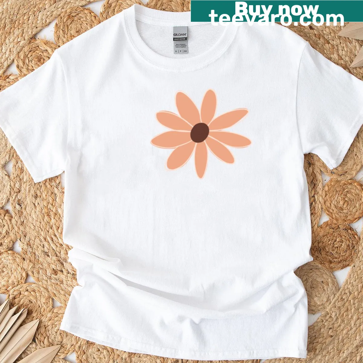 Minimalist wildflower doodle on a sunset blush T-shirt — on a men's t-shirt