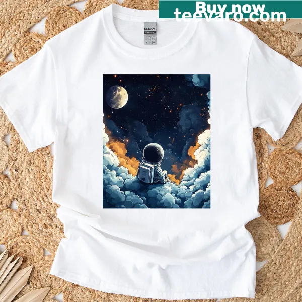Graphic T-shirt of an astronaut sitting on a cloud looking at the moon