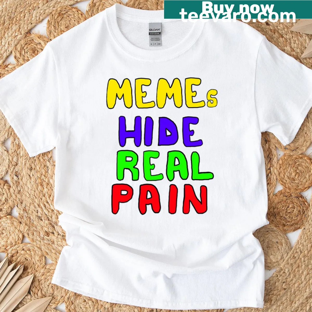 T-shirt with the phrase Memes Hide Real Pain in bold typography — on a men's t-shirt