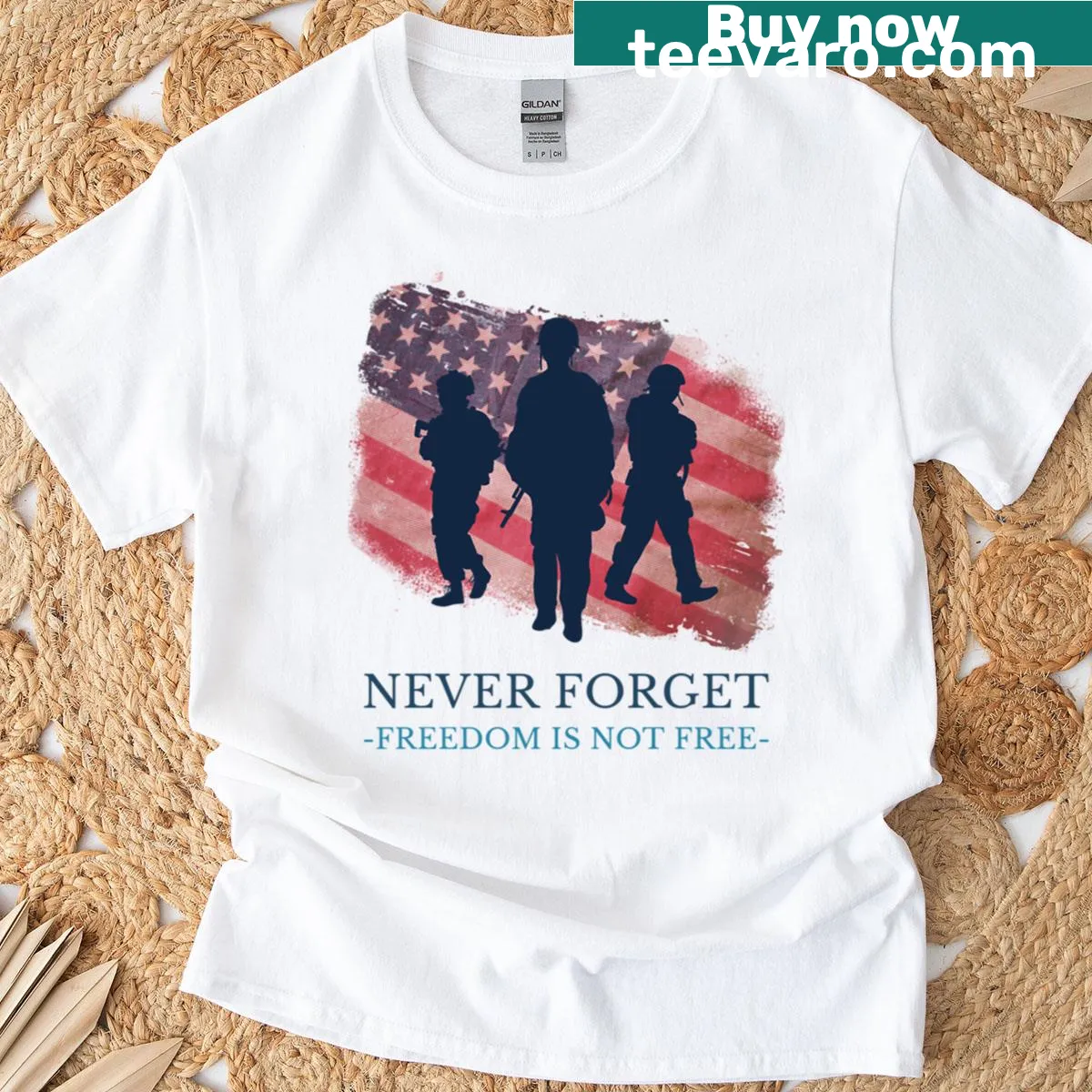 Patriotic t-shirt with 'Never Forget Freedom Is Not Free' text — on a men's t-shirt