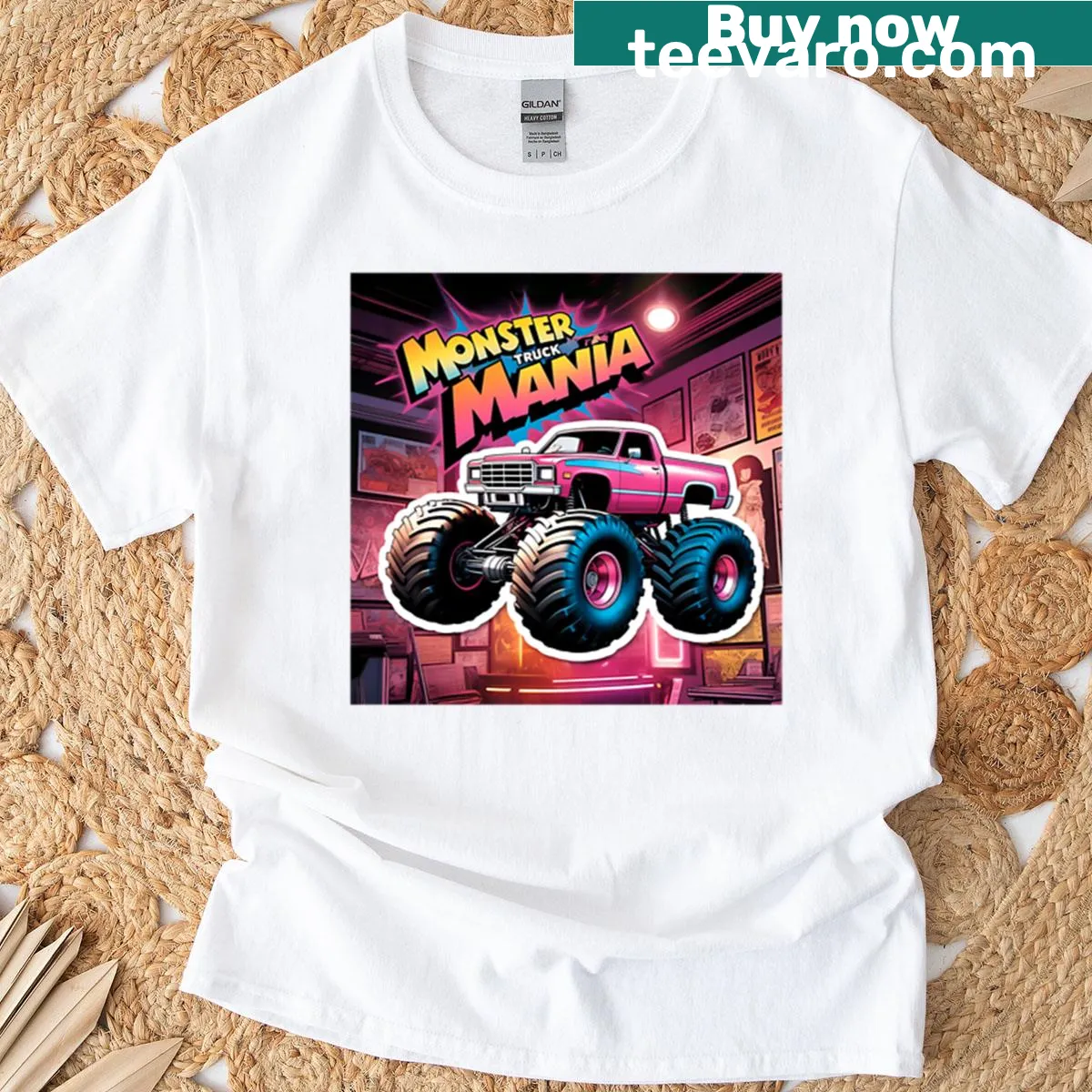 T-shirt with a cartoon-style pink monster truck graphic — on a men's t-shirt