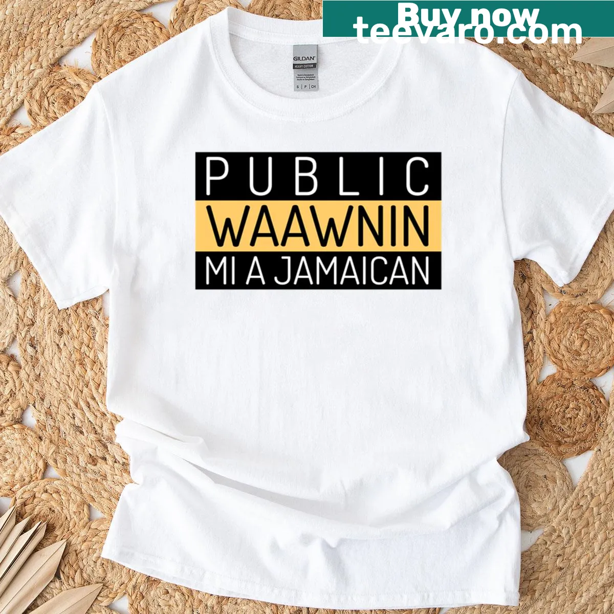 T-shirt featuring the phrase 'Public Waawnin Mi A Jamaican' — on a men's t-shirt