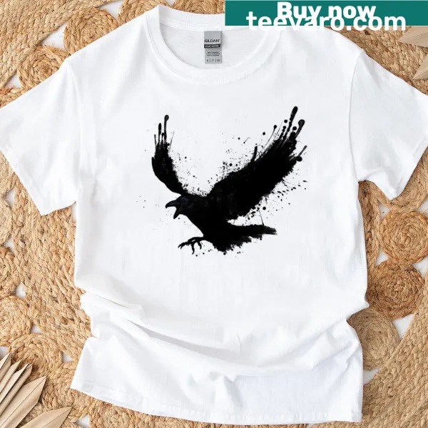 Oversized T-shirt featuring an artistic raven graphic