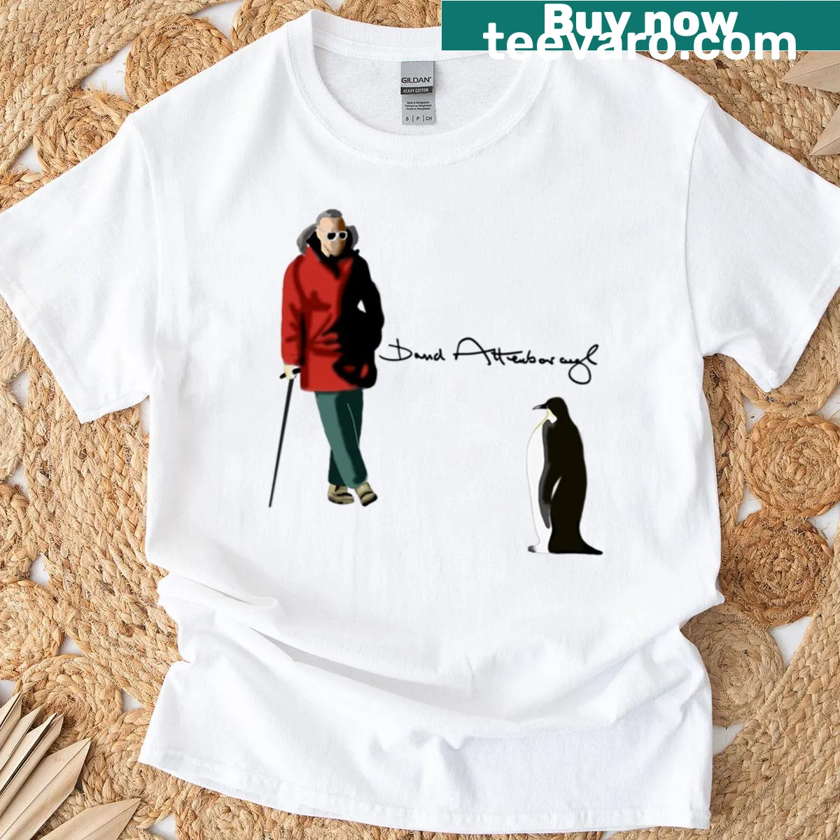 Charming t-shirt featuring David Attenborough and a penguin — on a men's t-shirt