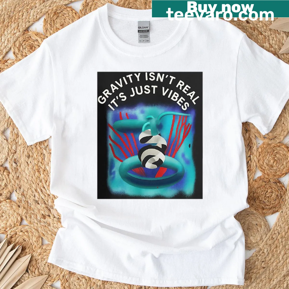 Bold typography t-shirt stating 'Gravity Isn't Real' for edgy style — on a men's t-shirt