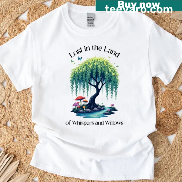 T-shirt featuring whimsical illustration of a fantasy landscape