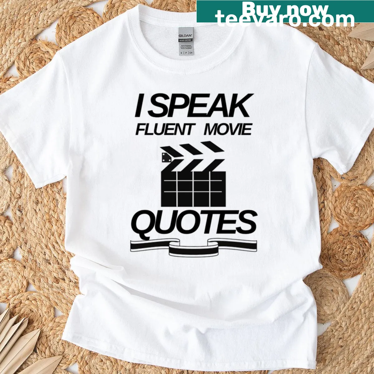 T-shirt featuring the phrase 'I Speak Fluent Movie Quotes' in bold text — on a men's t-shirt