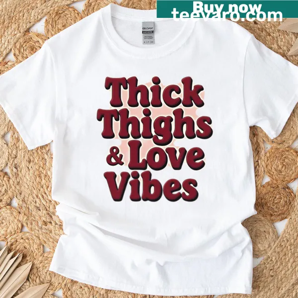 Inspirational graphic saying 'Thick Thighs And Love Vibes' on T-shirt