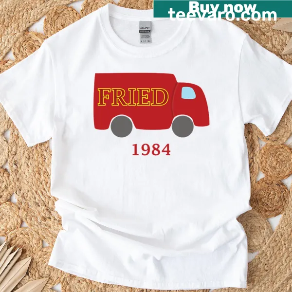 Cartoon truck graphic with text 'Fried' on a playful T-shirt.
