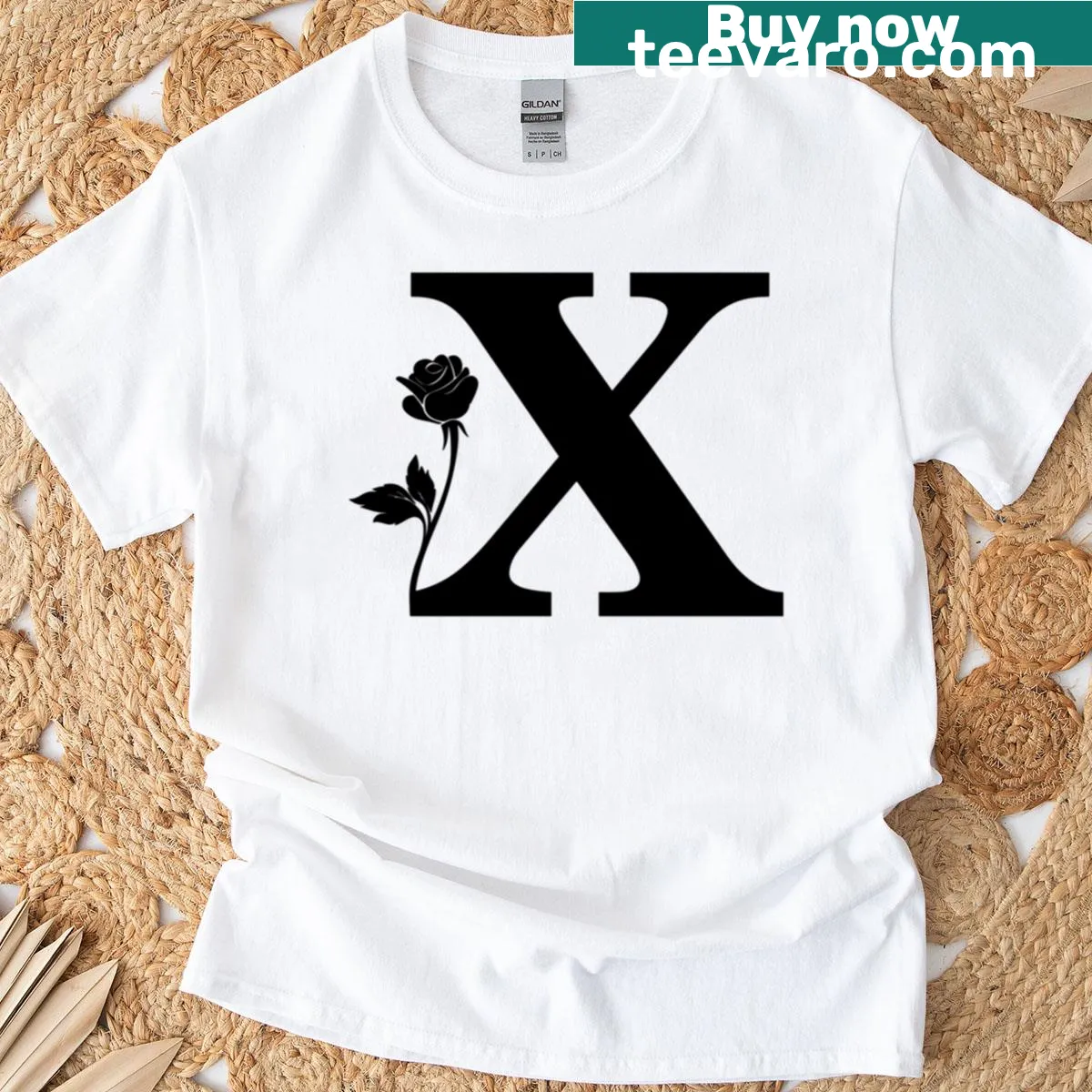 Floral letter X with rose design on a stylish t-shirt — on a men's t-shirt