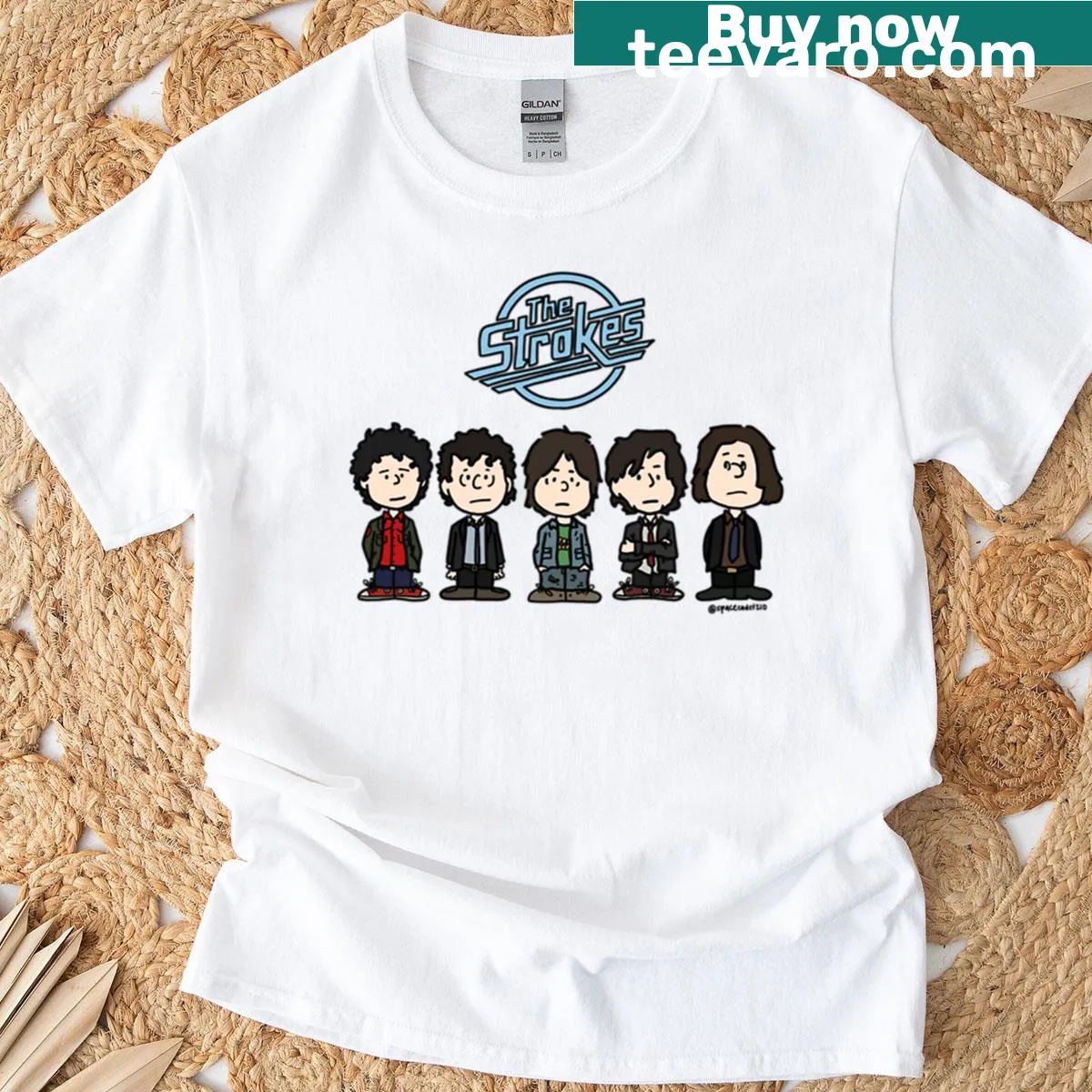 Cartoon representations of The Strokes band members on a t-shirt — on a men's t-shirt
