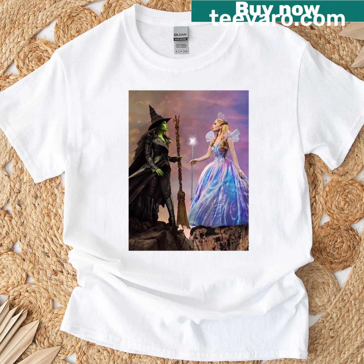 Illustrated oversized t-shirt featuring Elphaba and Glinda from Wicked. — on a men's t-shirt