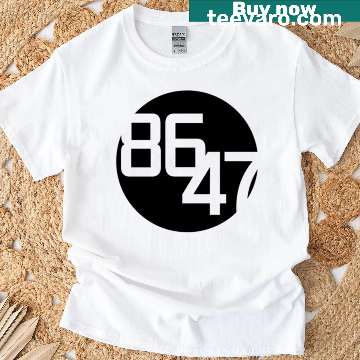 Minimalist T-shirt featuring a bold black dot design — on a men's t-shirt