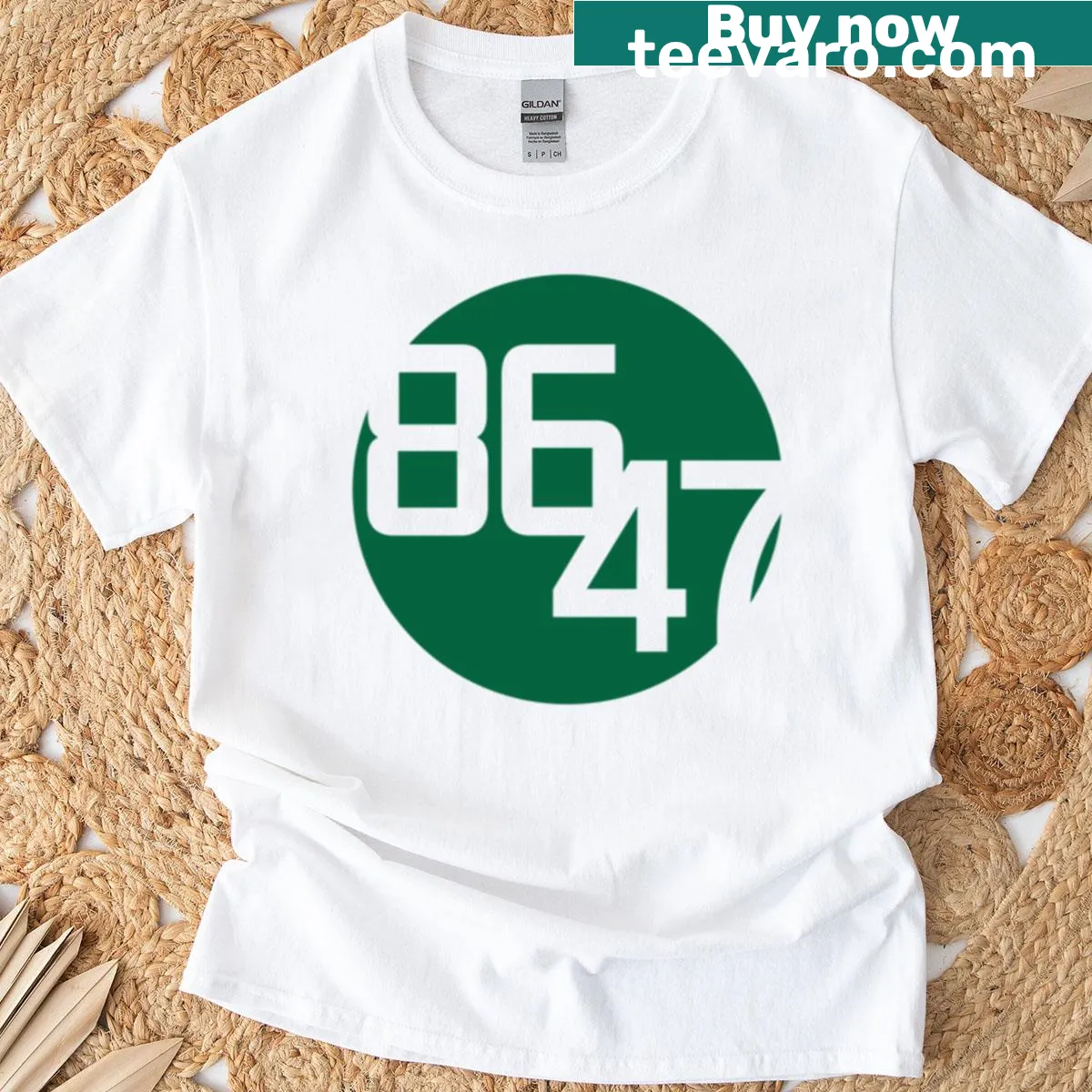 Minimalist T-shirt featuring a central dark green dot design — on a men's t-shirt