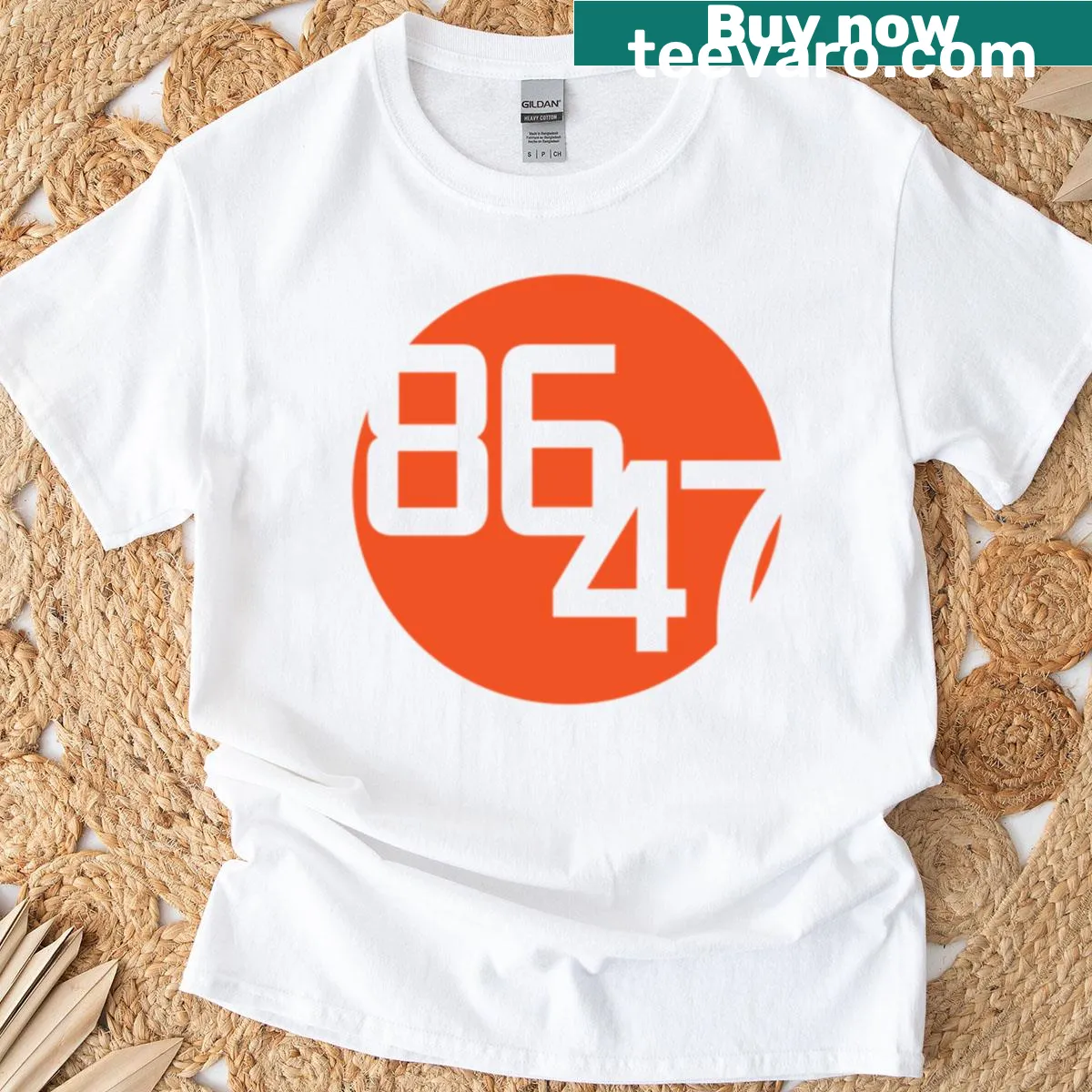 Minimalist active T-shirt featuring a bold orange dot design — on a men's t-shirt