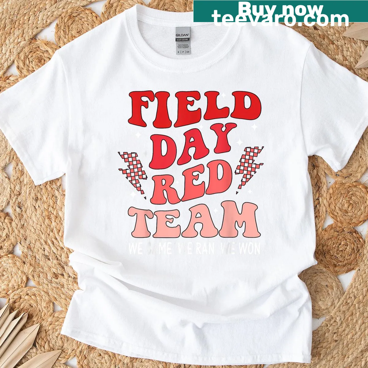Red Team Field Day T-shirt with sports-themed text design — on a men's t-shirt