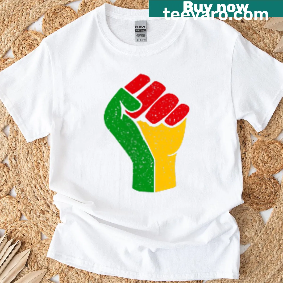 Juneteenth T-shirt featuring a symbolic fist and equality message. — on a men's t-shirt