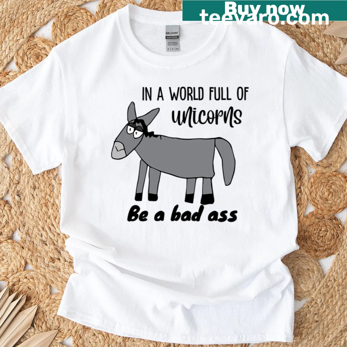 T-shirt featuring the phrase 'In A World Full Of Unicorns Be A Bad Ass Dopey Donkey' — on a men's t-shirt