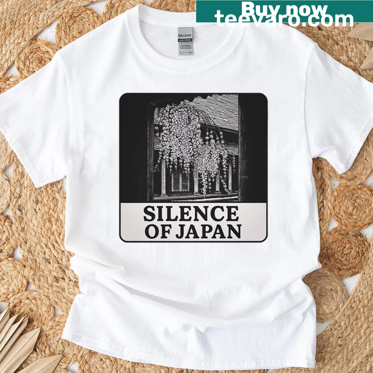 Monochrome Japanese aesthetic t-shirt with serene imagery — on a men's t-shirt