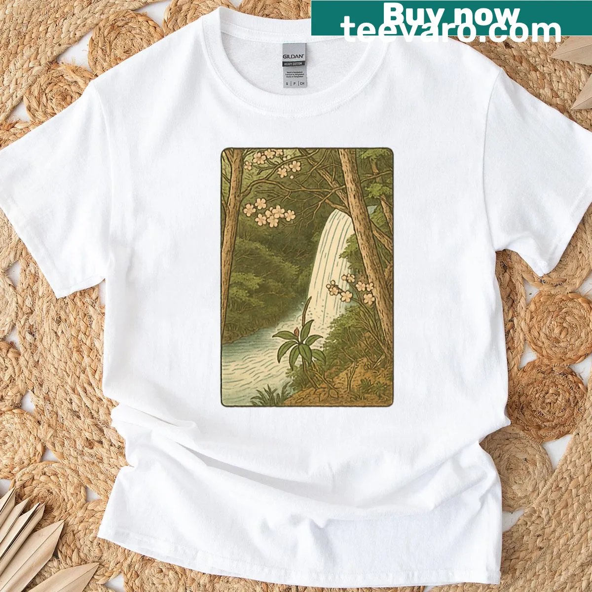 T-shirt featuring a tranquil spring scene of a waterfall and wildflowers — on a men's t-shirt