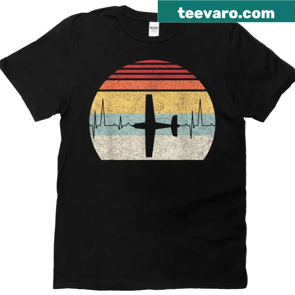 Vintage t-shirt featuring a heartbeat design and pilot graphics.