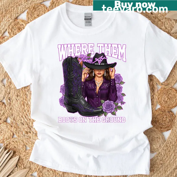 Graphic t-shirt with cowgirl boots and humorous text