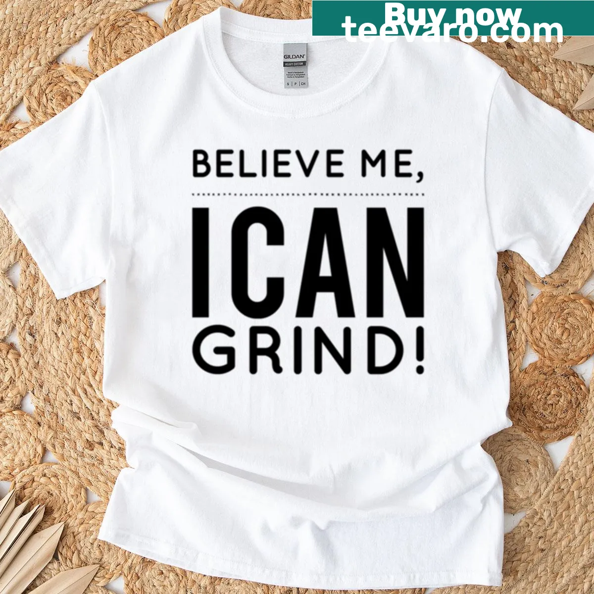 Bold typography oversized t-shirt with the text 'Believe Me I Can Grind' — on a men's t-shirt