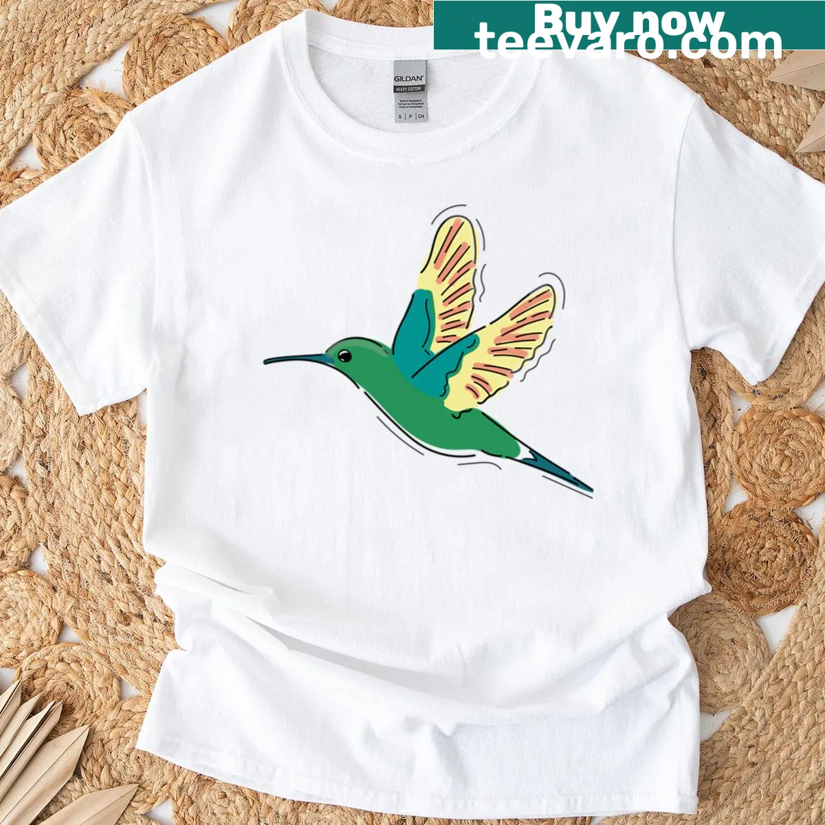 Oversized t-shirt featuring an illustration of a colibri bird — on a men's t-shirt