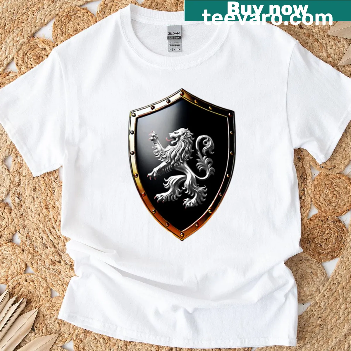 T-shirt with regal silver lion shield on a bold black background — on a men's t-shirt