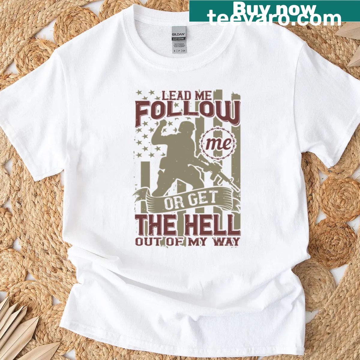 Bold graphic tee with military phrase in strong typography — on a men's t-shirt