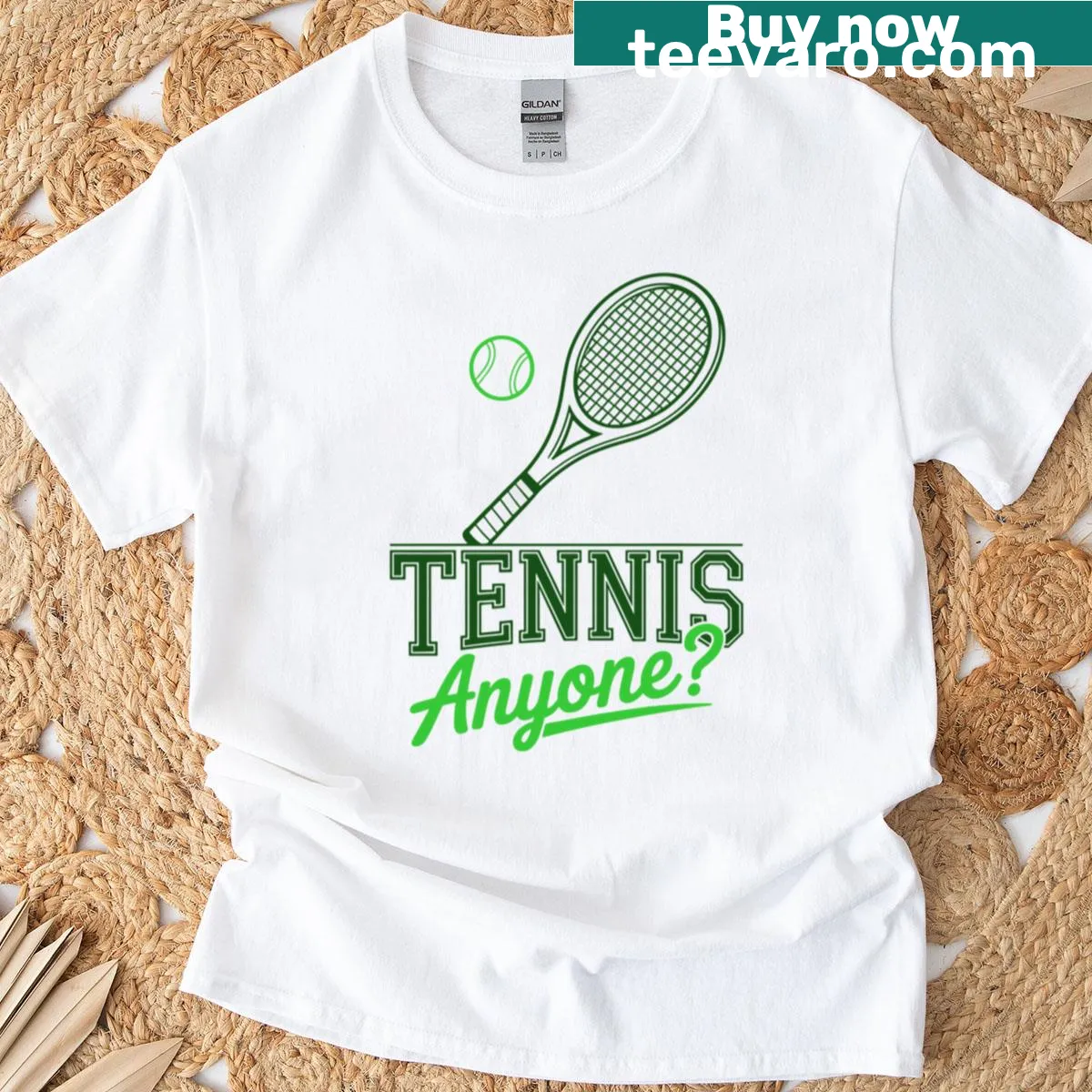 Playful T-shirt with the phrase Tennis Anyone in bold typography — on a men's t-shirt
