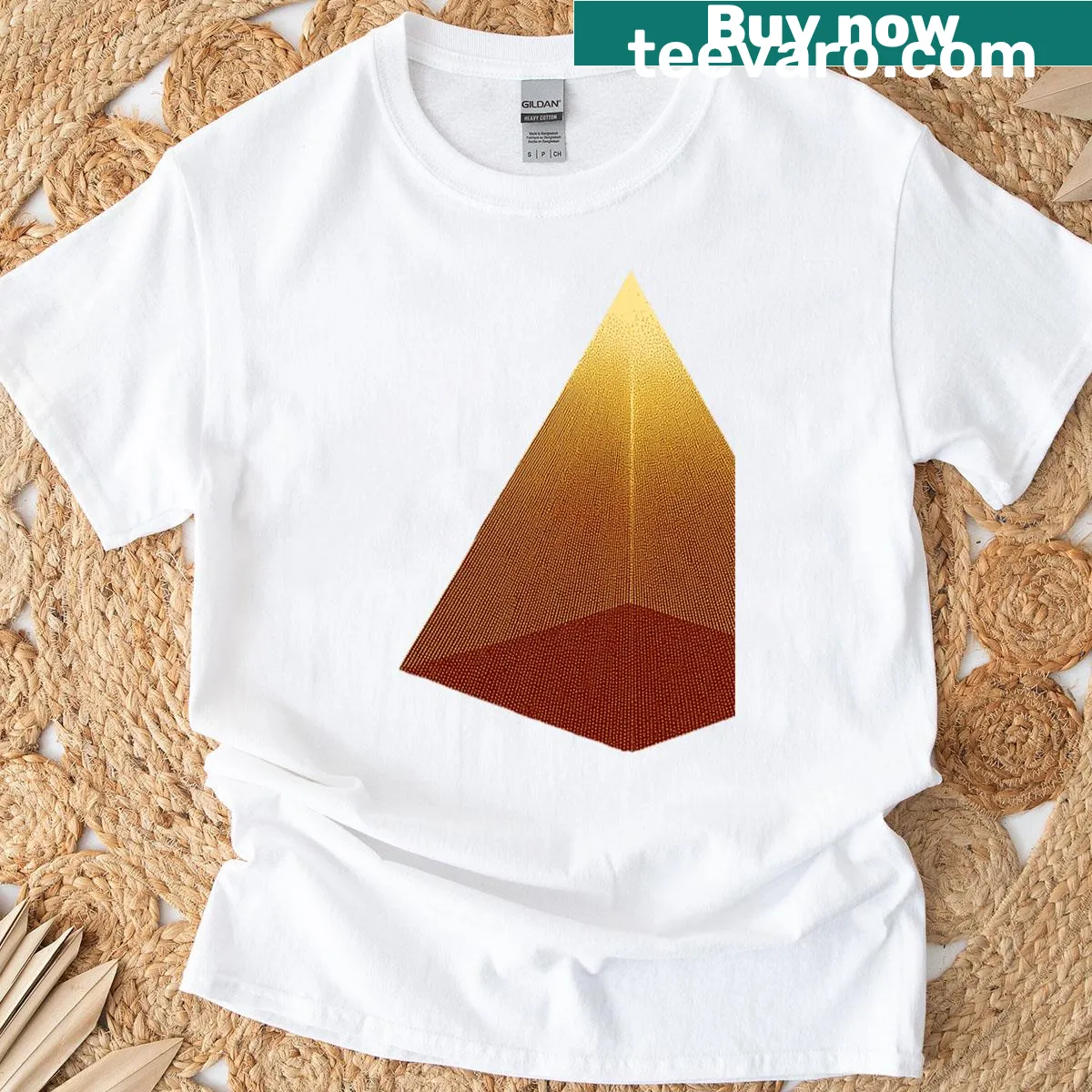 Minimalist T-shirt with geometric golden pyramid and radiating light design — on a men's t-shirt
