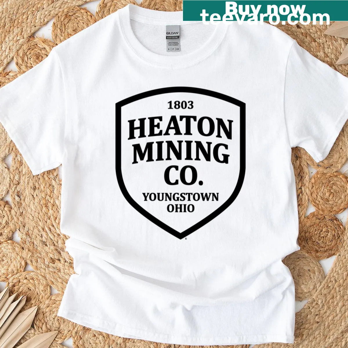 Vintage-style Heaton Mining Co logo graphic — on a men's t-shirt