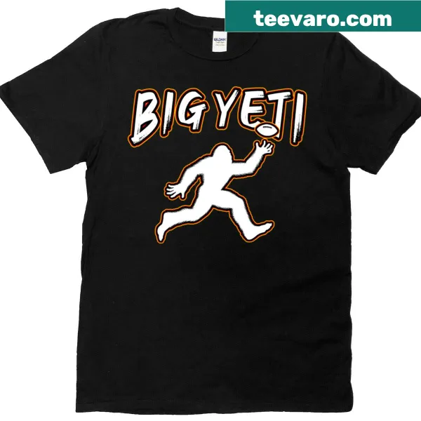 Cartoon yeti playing football on Travis Kelce T-shirt