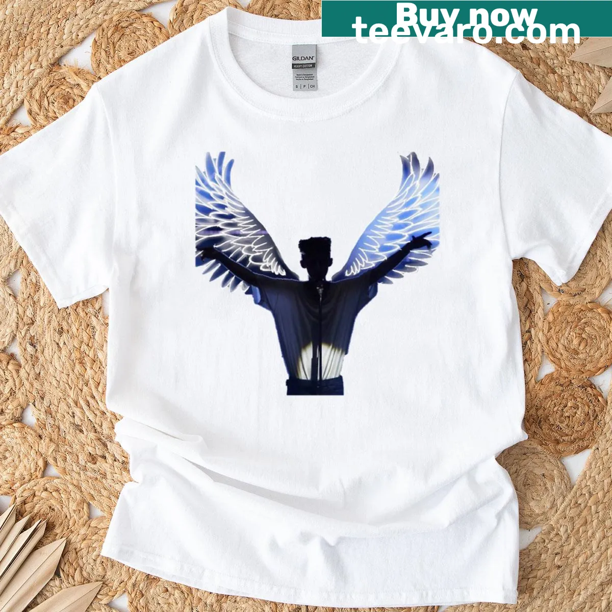 Oversized T-shirt featuring an illustrated angel design inspired by Troye Sivan. — on a men's t-shirt