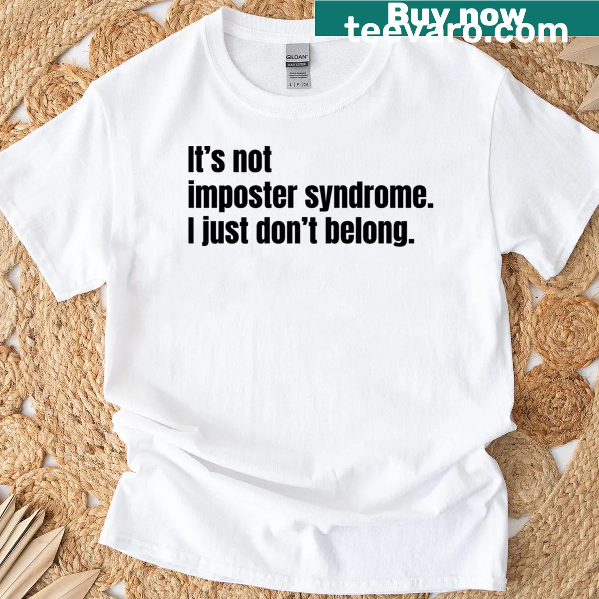 Humorous t-shirt with the phrase 'It's Not Imposter Syndrome I Just Don't Belong' in bold typography — on a men's t-shirt