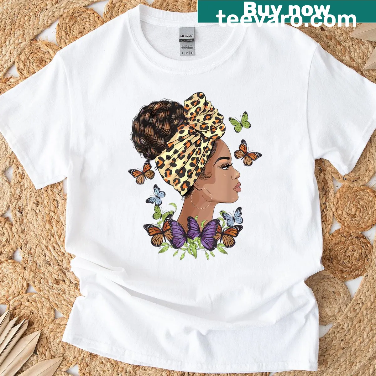 T-shirt featuring Kente cloth-inspired print celebrating African art — on a men's t-shirt