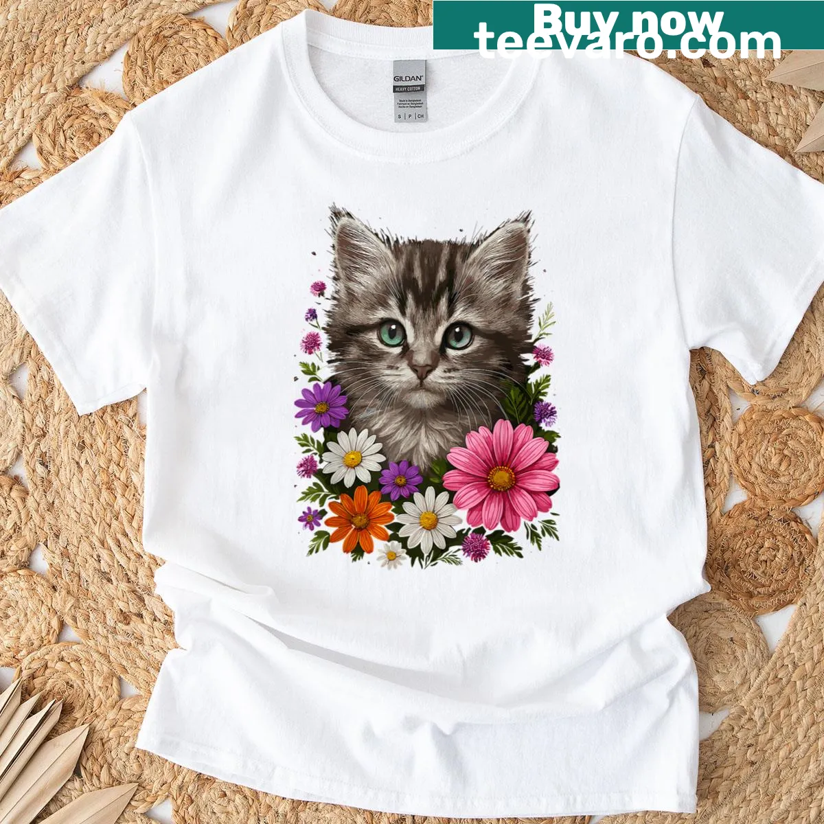 Cute kitten illustration with floral accents on a t-shirt — on a men's t-shirt