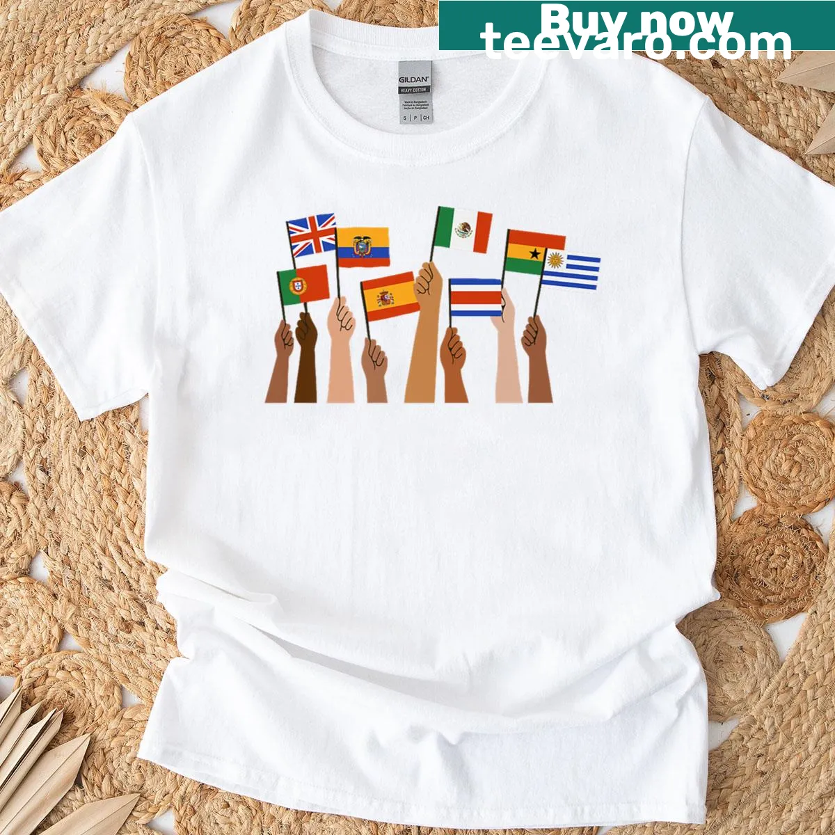 T-shirt featuring hands holding flags in a patriotic design — on a men's t-shirt