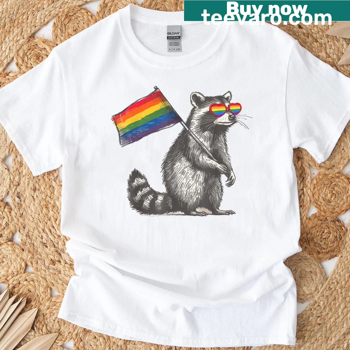 Illustration of a raccoon with a pride flag for LGBTQIA+ celebration — on a men's t-shirt