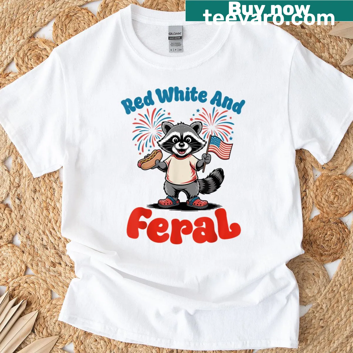 Illustration of a raccoon with a hot dog celebrating July 4th — on a men's t-shirt