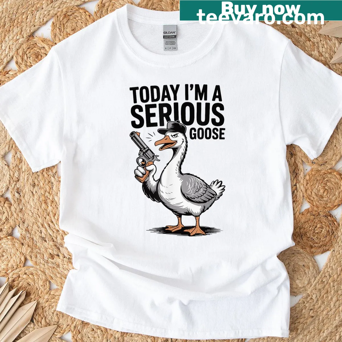 Funny T-shirt featuring a serious goose with a gun graphic — on a men's t-shirt